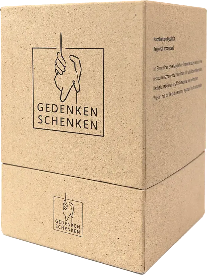 Naturfarbene Schachtel mit Logo „Gedenken schenken“ aus Graspapier-Karton